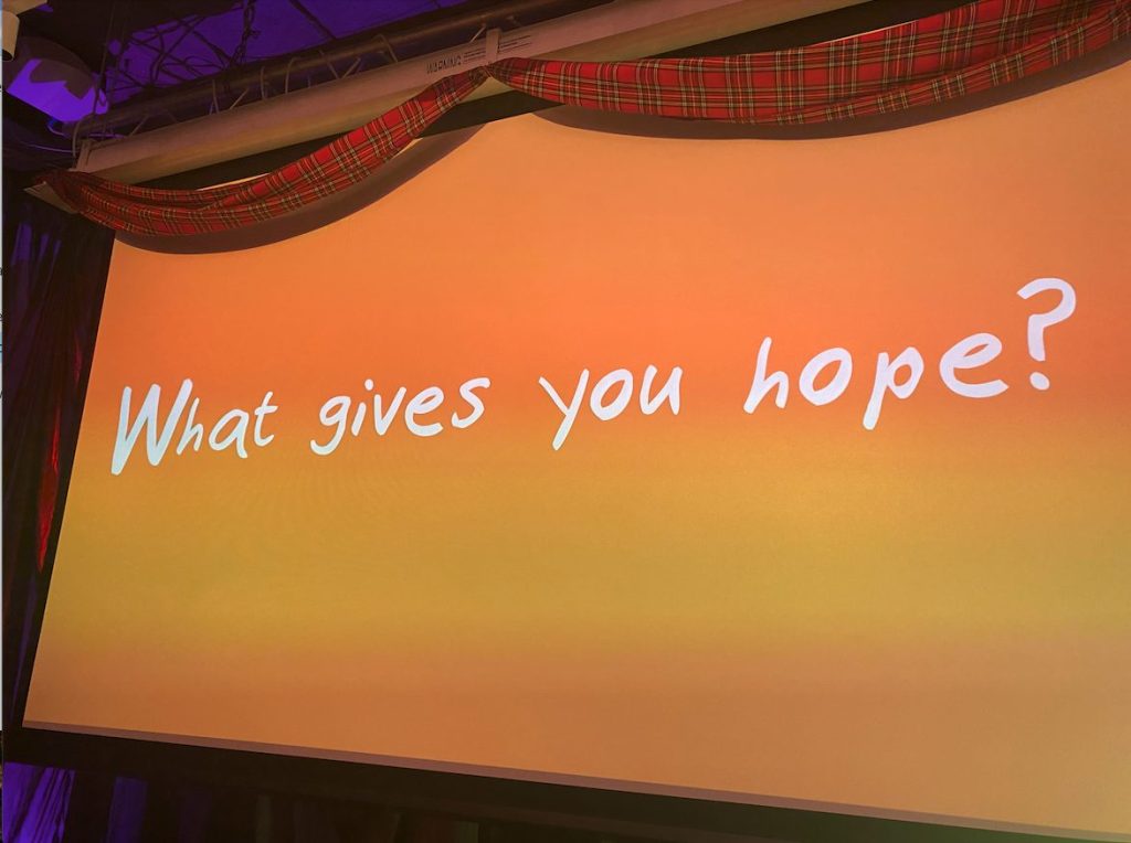 a screen displaying the words, what gives you hope